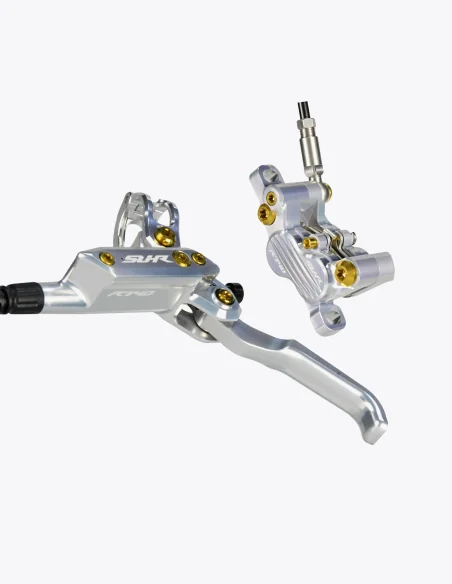 Maneta y pinza frenos SUHR en color plata y tornillos de titanio en color dorado