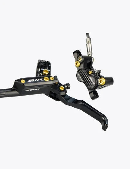 Maneta y pinza frenos SUHR en color negro y tornillos de titanio en color dorado